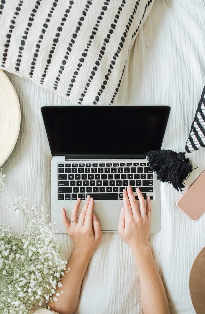 Person typing on a MacBook Pro